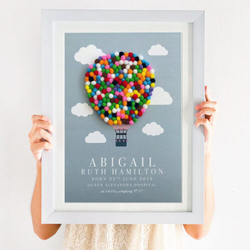 This Personalised Hot Air Balloon Pom Pom Nursery Print is totally unique. Created using multi coloured pom poms, this print will brighten any nursery or play room.