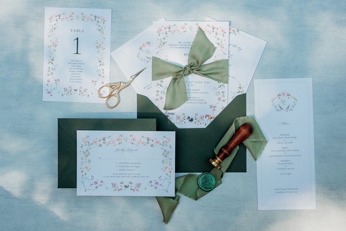 sage and floral invitations